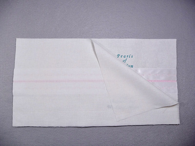 A picture containing paper, paper product, stationary, envelope